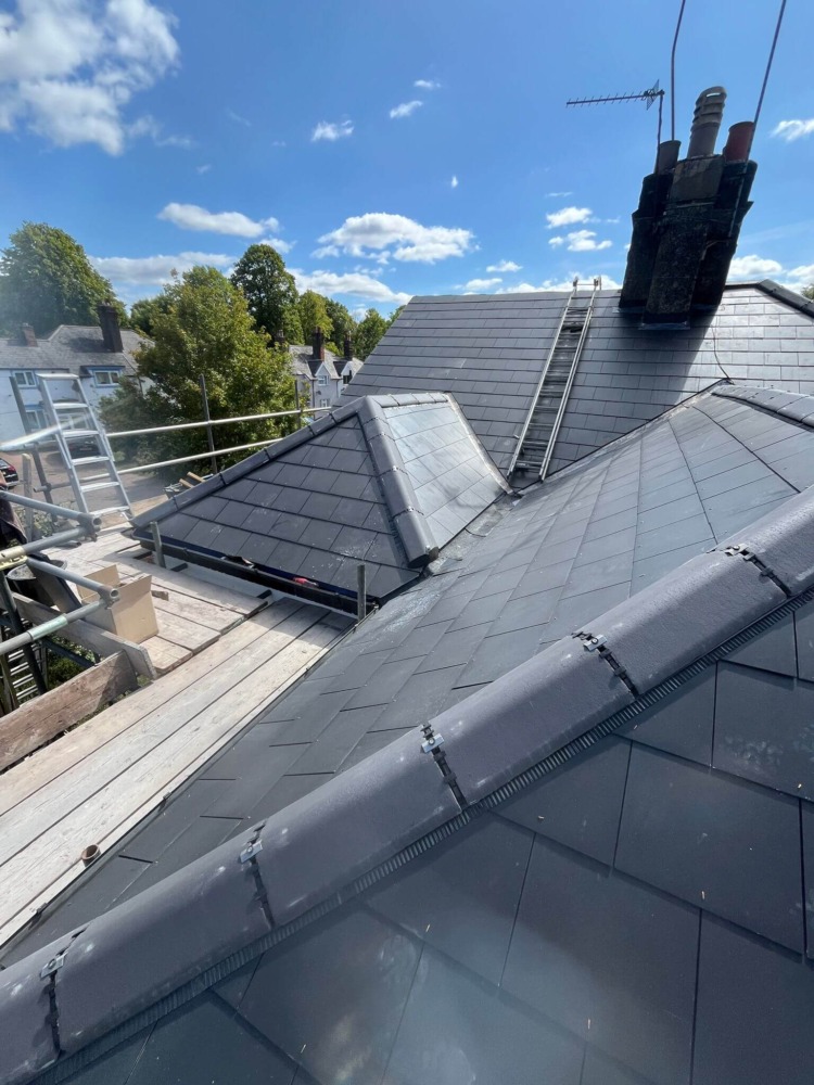 Professional roofing team working on residential property in Birmingham West Midlands